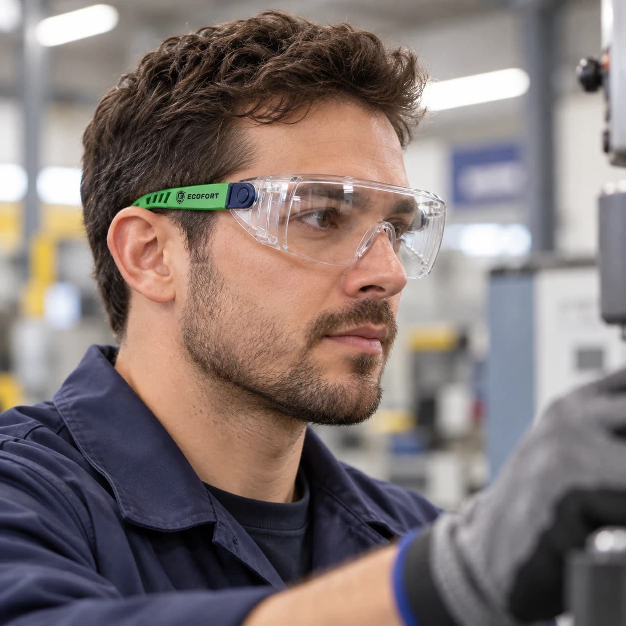 EYP127 Over-the-Glasses (OTG) Safety Glasses shown worn in an industrial setting