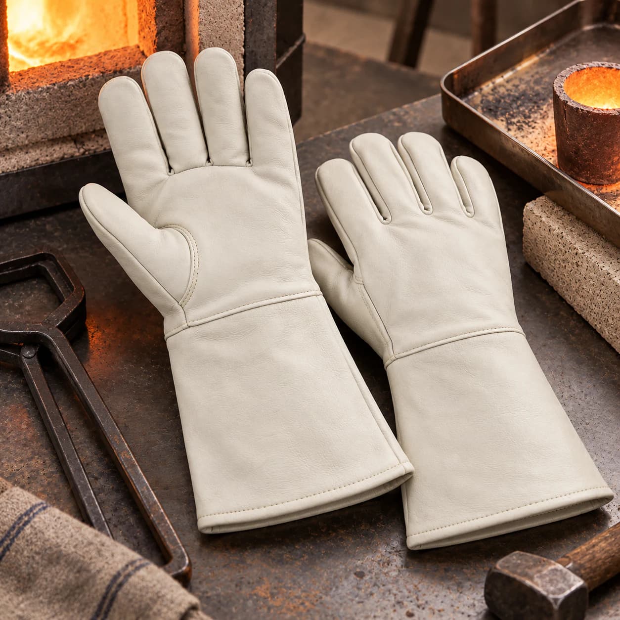 HDP711D300 Heat Resistance Gloves shown beside an industrial furnace
