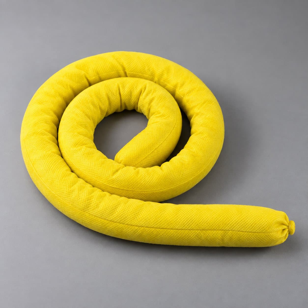 Yellow chemical absorbent sock for industrial spill containment